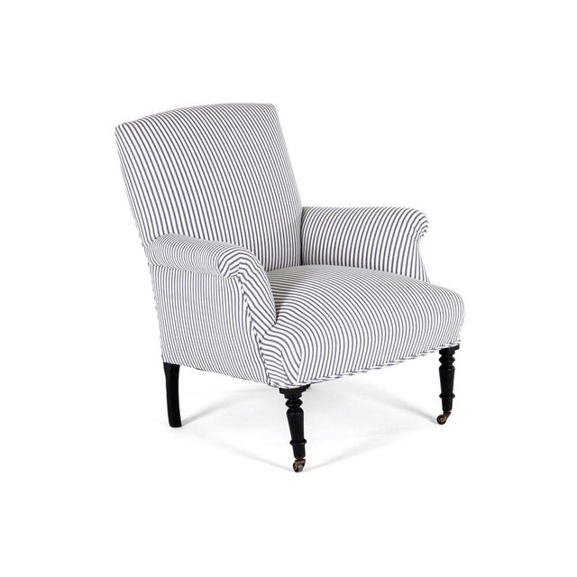 A 19th century french napoleon iii square back armchair with a low back and a wide generous seat. The beech frame is...