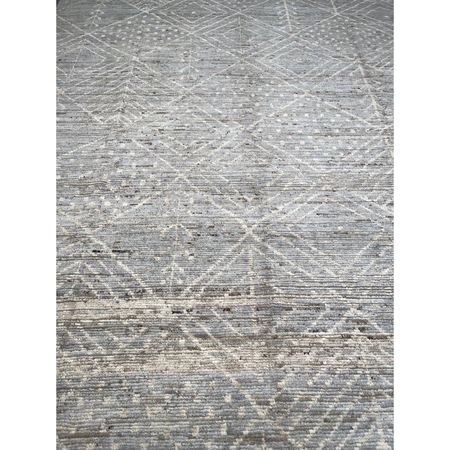 Hand knotted of top quality natural dyed wool and cotton in Afghanistan. This unique and innovative Navajo style Rug is an...