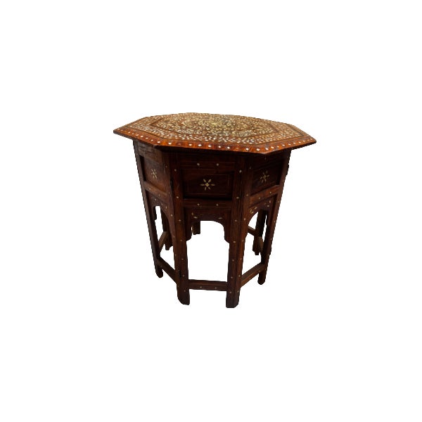 Beautiful antique Anglo Indian folding table with bone inlay. The table features an octagonal tabletop with a central...