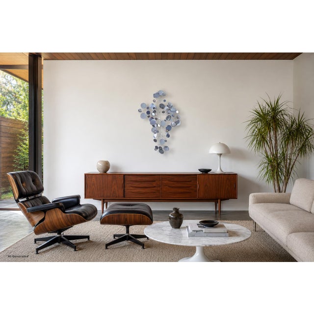 Mid-century modern "Raindrops" chrome wall sculpture by Curtis Jere, designed and manufactured in the United States, circa...