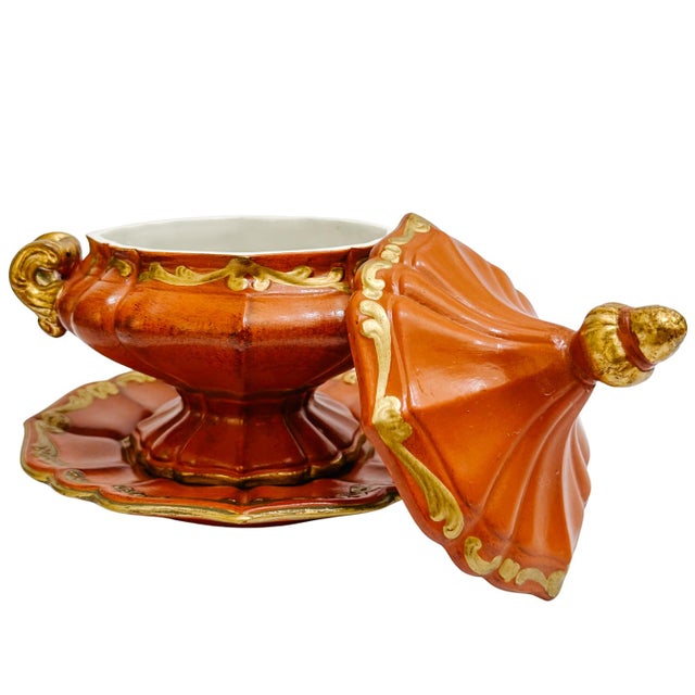 An Old World Mediterranean style hand-painted Italian ceramic tureen. Crafted in Italy, this three-piece set features a...