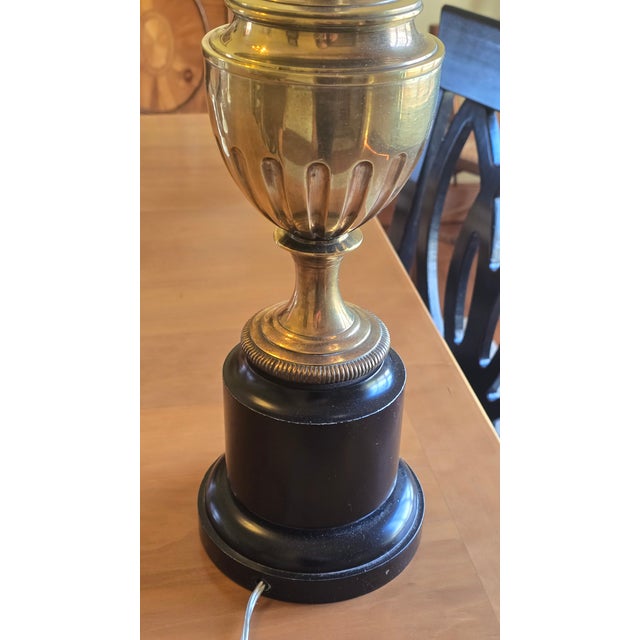 Beautiful, statuesque brass lamp believed to be manufactured by the Stiffle Lamp Company in the middle to late 1950's. A...