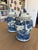 A charming pair of ginger jars finished in soft blue and antique white. Their classic rounded forms are accented with...