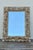 Beautiful antique carved wood wall mirror featuring an elaborate hand-carved frame with deep acanthus leaf and foliate...