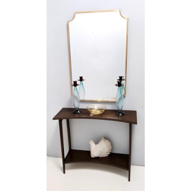Made in Italy, 1980s. This console table features an ebonized beech frame with a lower shelf. It is a vintage piece,...