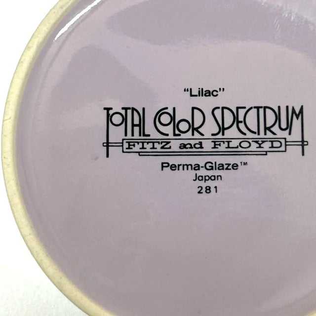 Lilac cups and saucers, group of 8. This group of lilac perma-glaze cups and saucers are a timeless modern classic,...