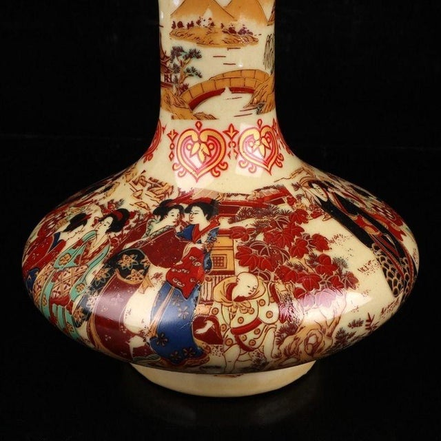 This is a beautiful vintage Chinese enameled porcelain vase, featuring a distinctive "flat belly" (Bian Du) shape with a...