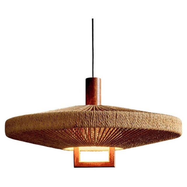 Pendant lamp by Temde Leuchten, commonly referred to as the “UFO” model. The flat, disc-shaped form features a central...