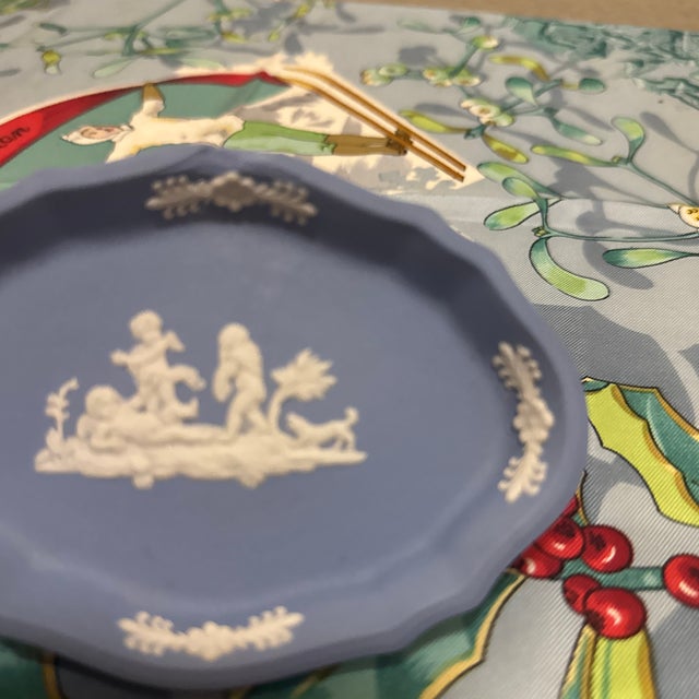 This elegant vintage trinket dish is a classic example of Wedgwood Jasperware, featuring the brand's iconic "Wedgwood...
