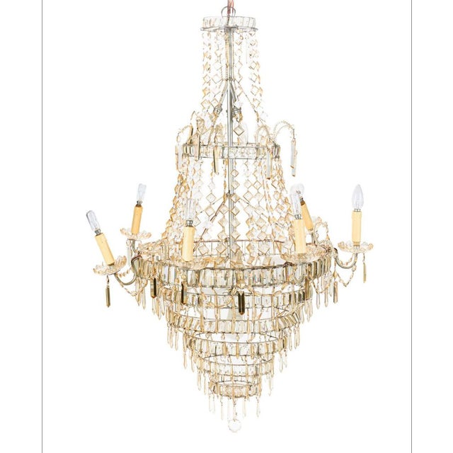 A large and elegant Spanish crystal chandelier attributed to the renowned Royal Glass Factory of La Granja, dating from...