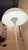 The fixture emits a soft and comfortable illumination. The hemispherical shade reflects the light downwards, and the...