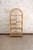 Pair Of Arched Bamboo Bookcases with Woven Rush Fabric – 1970s Pair of bookcases with an asymmetrical structure crafted in...
