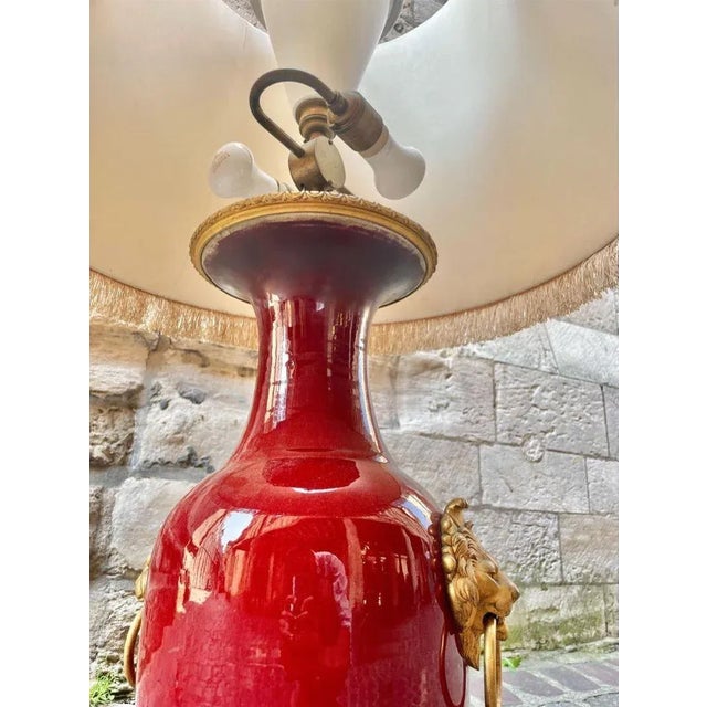 Large Bronze Table Lamp with Lions Heads, in Very Good conditions. Up to 250V (Europe/UK Standard).The wiring of this item...