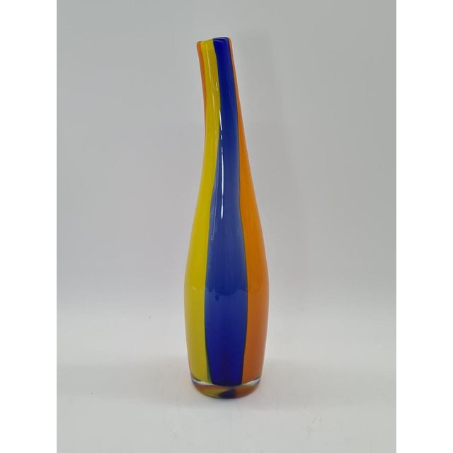 An impressive art glass vase crafted using the Sommerso technique, attributed to the Murano workshops in Italy. Its unique...