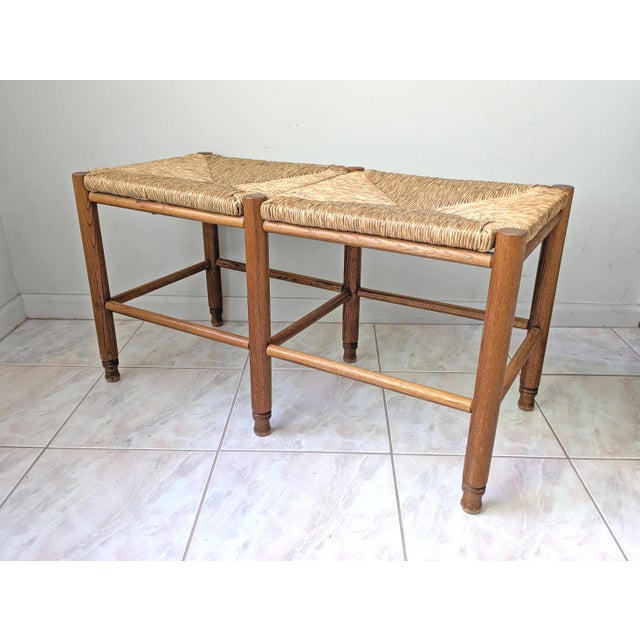 A rustic vintage wooden bench with woven seagrass bench top. A perfect seating option for a mudroom, bedroom, closet or...
