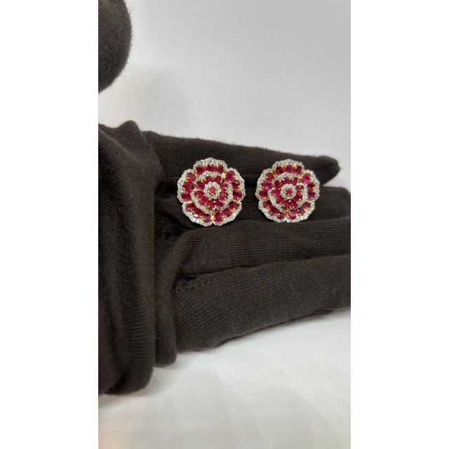 Gemstone details Diamond weight: 1.39 cts Ruby weight: 11.37 cts 14K gold Gross weight: 17.05 grams Gold weight: 14.49...