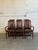 This set of six high-back dining chairs features an elegant slat-back design with supportive vertical spines. The...