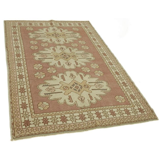This Turkish handmade Anatolian rug is a timeless piece of craftsmanship, created in the heart of Anatolia, Turkey, a...