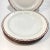 This interesting set of 4 dinner plates is painted with swags in maroon and gold. Dimensions: 9.125” x 9.125” x 1.125”...