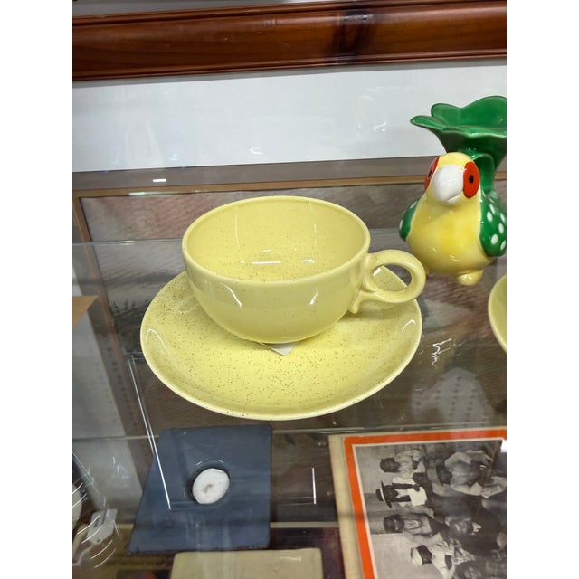 Bring authentic 1950s atomic style to your table with this vintage partial dinnerware set by Taylor, Smith & Taylor in the...