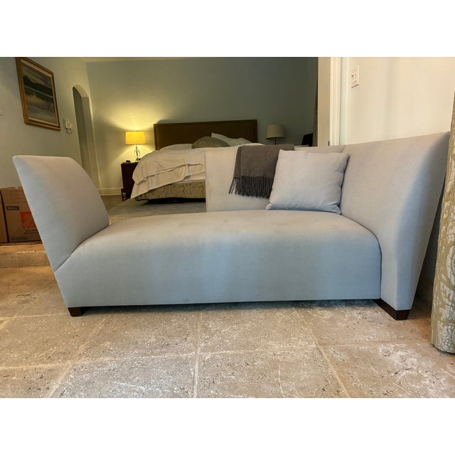 Authentic Donghia asymmetrical upholstered daybed / settee featuring dramatic angled arms and sculptural modern lines....