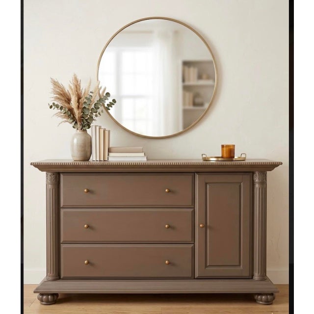 Beautifully restored dresser, featuring a clean and sophisticated aesthetic. This versatile piece combines traditional...