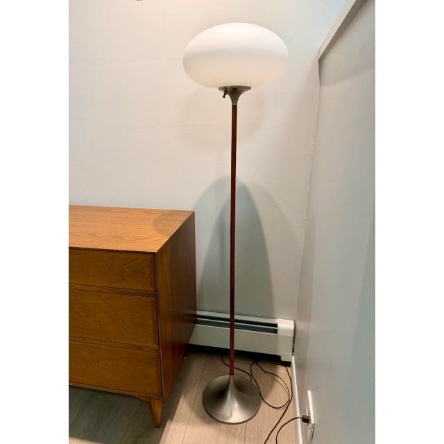 Add a masterpiece of 100% authentic mid-century modern design to your home. This stunning floor lamp from the renowned...