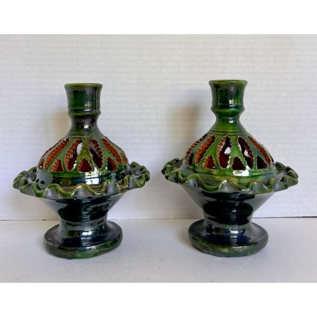 Here is a beautiful pair of vintage Spanish pottery candlesticks by Tito Úbeda, likely dating to the 1970s. Handcrafted in...