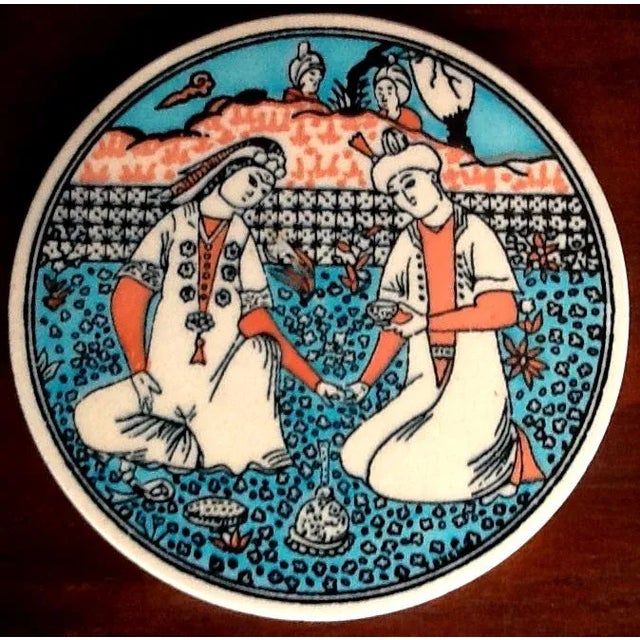 This very handsome hand painted circular ceramic tile will add a delightful decorative accent to any room. In vivacious...