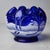 Elegant and eye-catching, this vintage Fenton glass vase features a rich cobalt blue hue and a beautifully ruffled rim in...