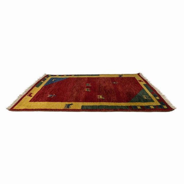 Gabbeh is a hand-woven rug traditionally made by the nomadic people. Gabbeh rugs are made from hand-spun wool dyed with...