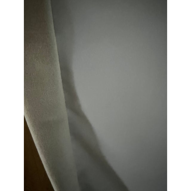 A single, brand-new ripple fold drapery panel from The Shade Store in their "Velvet Cream" colorway — soft, substantial...