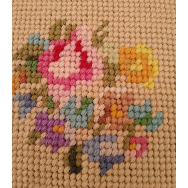 This mid-century round floral needlepoint pillow has an Old World vibe. There's a floral motif in the center surrounded by...