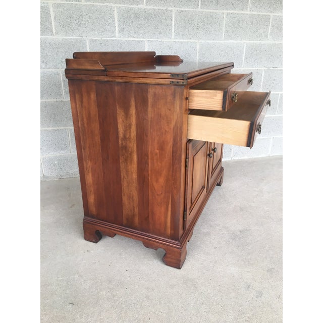 Description: Statton Furniture Old Towne Finish Flip Top Cherry Server. Normal Age Wear, such as light scuffs from daily...