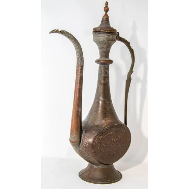 Antique Islamic Middle Eastern Qajar Persian Copper Ewer 19th Century. Rare Museum quality Antique piece from the early...