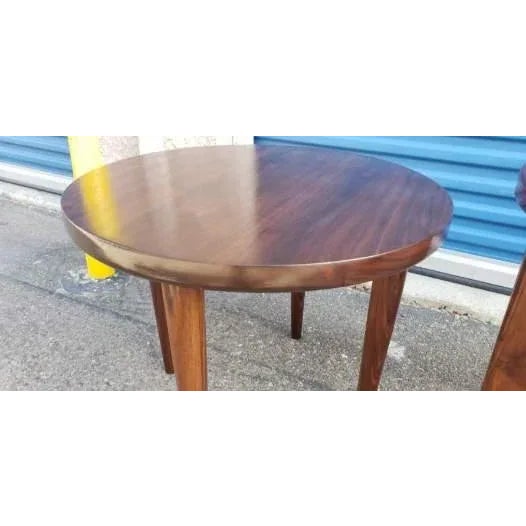 Modern mid century style solid walnut end table. Table was refinished by our shop and is in impeccable condition. Table...