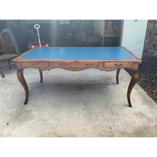 A very nice large custom made Maple and Fruitwood Louis XV1 style Country French Tooled leather top desk. Center drawer...