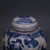 Add a touch of traditional Eastern artistry to your home with this charming blue and white porcelain ginger jar. This...