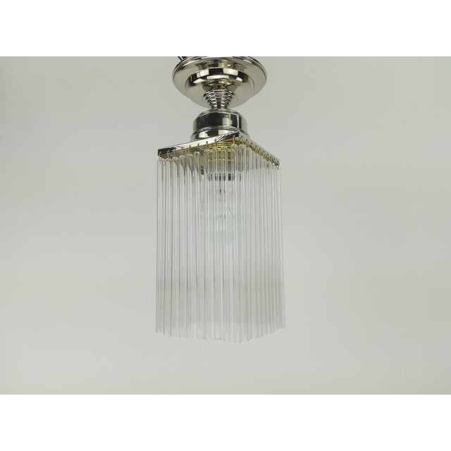 Brass chrome ceiling lamp with glass rods for small rooms. The lamp gives a cozy non-glare light. Polished surface. Newly...