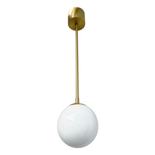 Uno Satin Brass Glossy White Globe Pendant by Fabio LTD For Sale