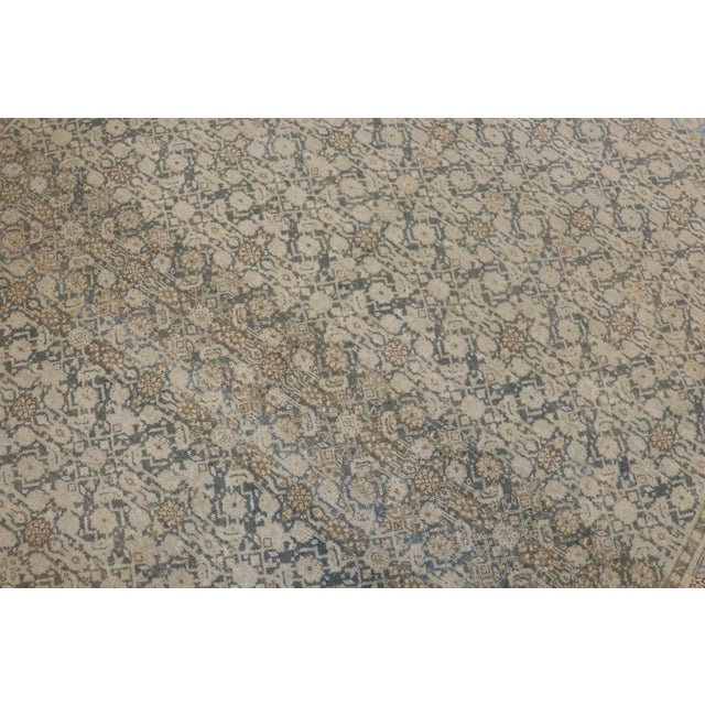 An early 20th century Persian Tabriz rug with your classic herati motif in brown, green, tan accents touches of light blue...