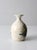A vintage handmade studio pottery vase by Clouds of Folsom featuring a softly rounded silhouette and narrow neck that...