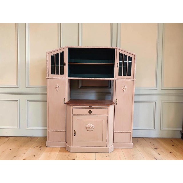 This antique sideboard dates back to around 1920 and combines the decorative elements of late Art Nouveau with the cleaner...