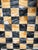 Vintage chess or checkers board made from gorgeous onyx and black marble. Just over 11" square.