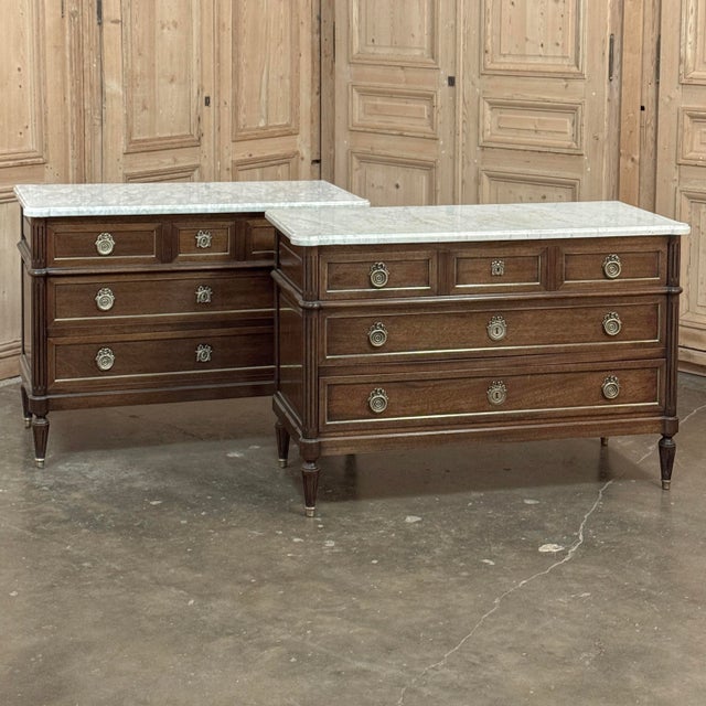 19th Century French Louis XVI Mahogany Commode with Carrara Marble will make a stunning addition to any room! Featuring...