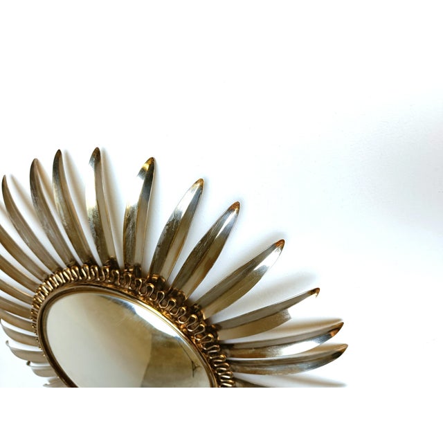 Mid century brass sunburst or flower mirror with convex glass. This mirror fits in most interiors and is a perfect add-on...