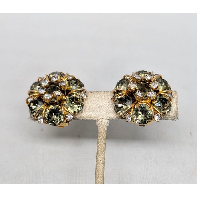 1950s goldtone round faux-citrines with wires wrapped around the edges andsmall round clear rhinestone accents clip...