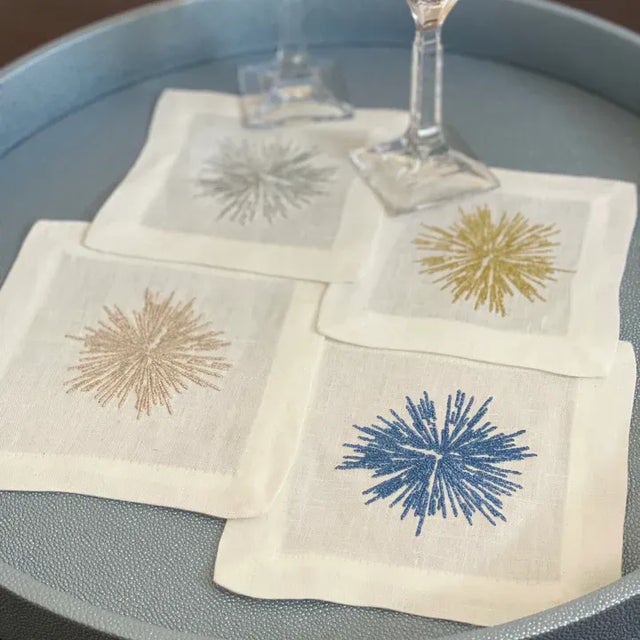 The Starburst Blue Cocktail Napkins - Set Of 4 Starburst cocktail napkins are a festive holiday must have! The explosion...