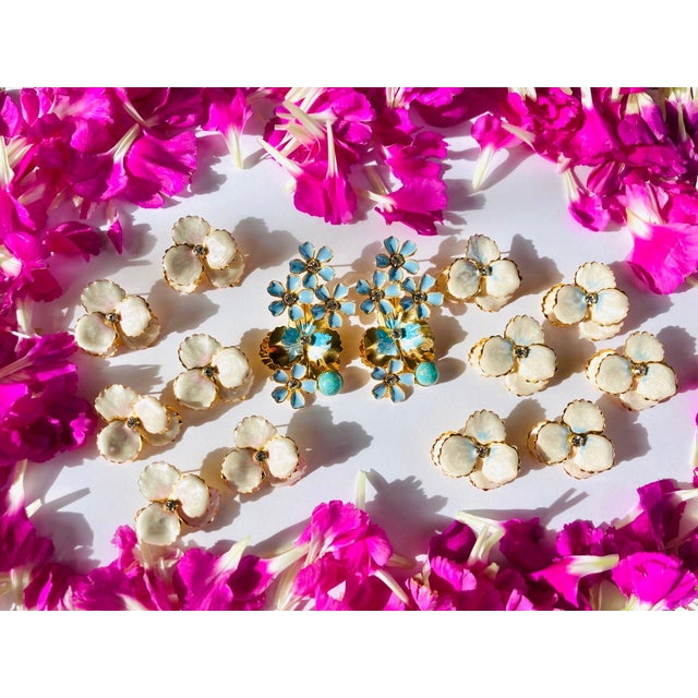 Posts. Swirls of pearl and pastels are hand-painted to create this gorgeous, one of a kind stud. 18k gold finish, nickel-free