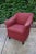 Brayton International club chair featuring wing arms, brick red upholstery and round black feet. Very attractive back,...